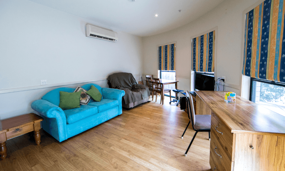 IMAGE: view of the property in Caulfield east - living room with chairs and 3 windows