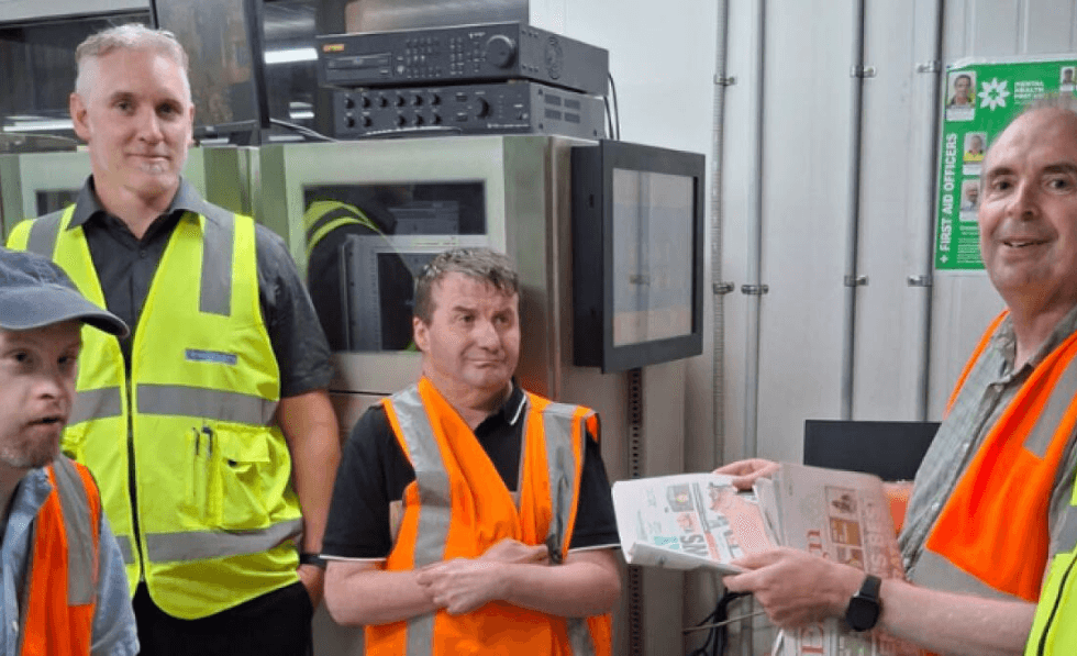 Yooralla clients tour McPherson Media printing press in Wodonga